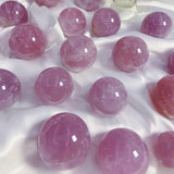 Purple rose quartz sphere