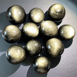 Gold obsidian sphere
