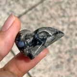 Crow head carving