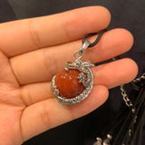 Dragon play ball pendant